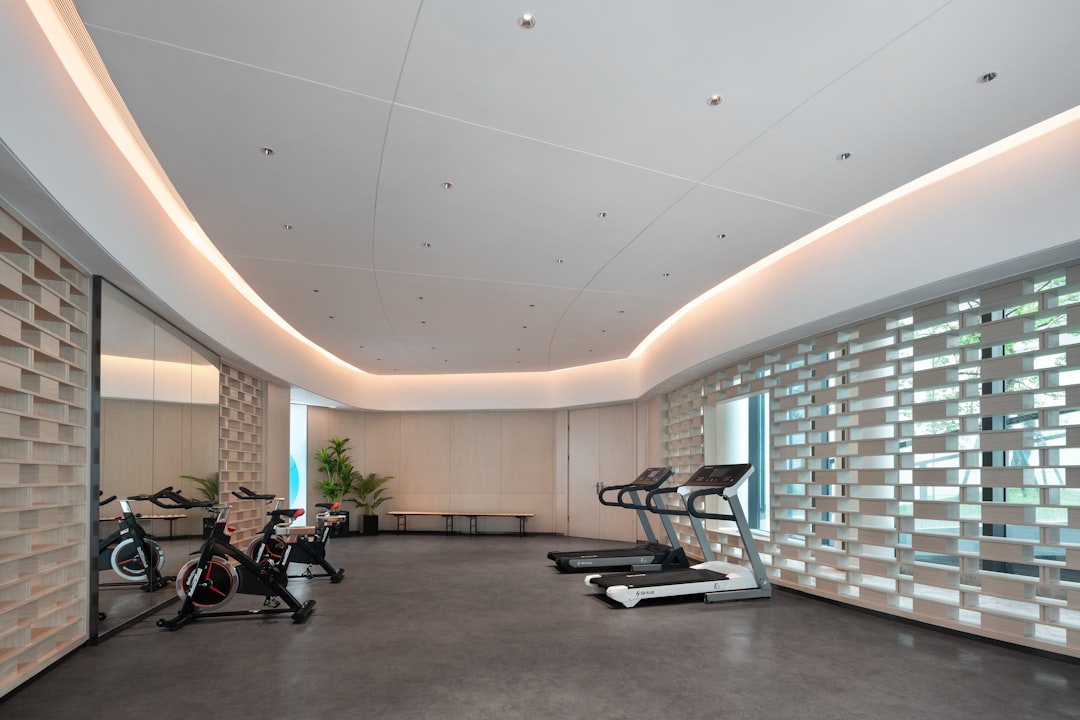 Modern gym with training mats and equipment at Sabai Muay Thai Kallang